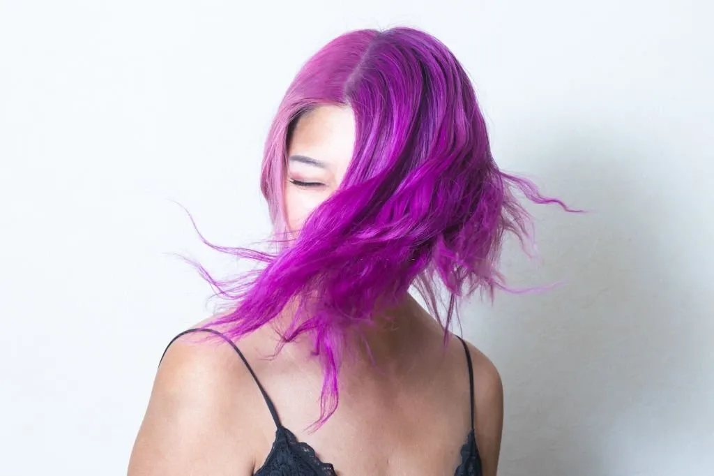 Neon Purple Highlights on Dark Hair